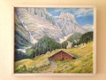 Paisaje alpino con cabaña y montañas